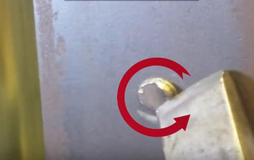 removing broken bolt using chisel